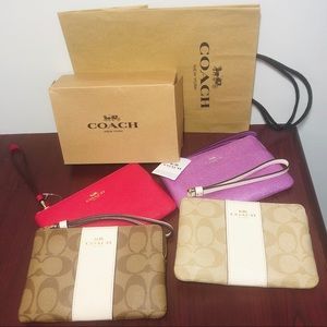 4 Coach wristlets